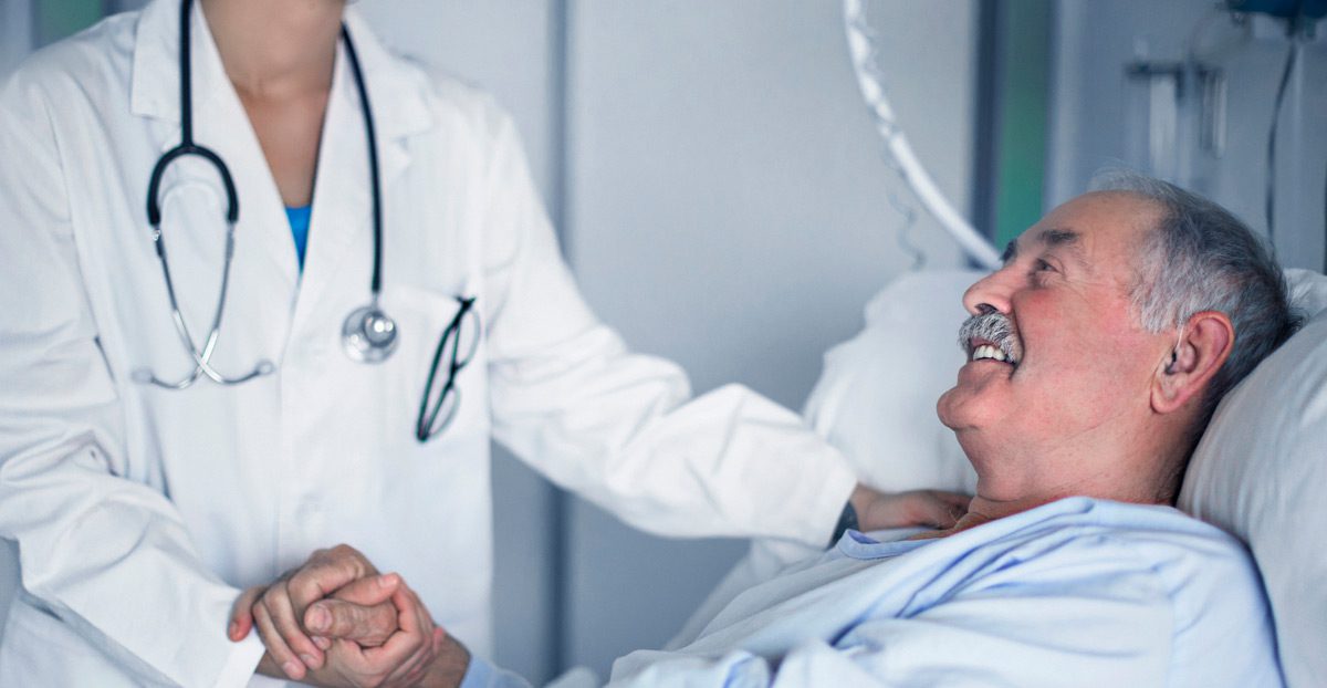 Doctor-taking-care-of-a-senior-man-in-the-hospital Doctor-taking-care-of-a-senior-man-in-the-hospital